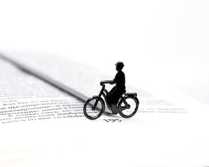 Lady on the Bike Bookmark - Elegant and Dynamic Design for Avid Readers and Cycling Enthusiasts - Atelier Article