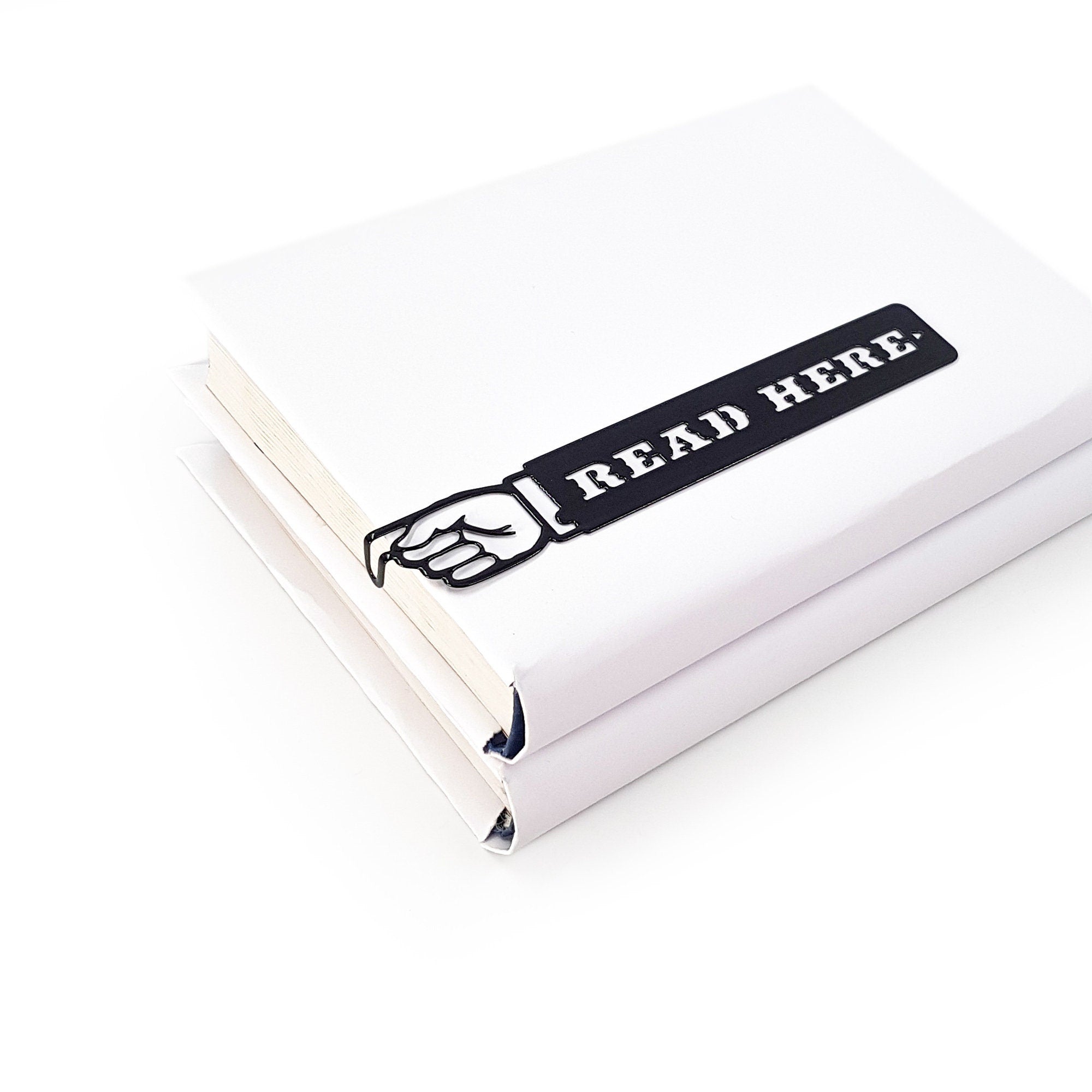 Bookmark "Read Here". - Atelier Article