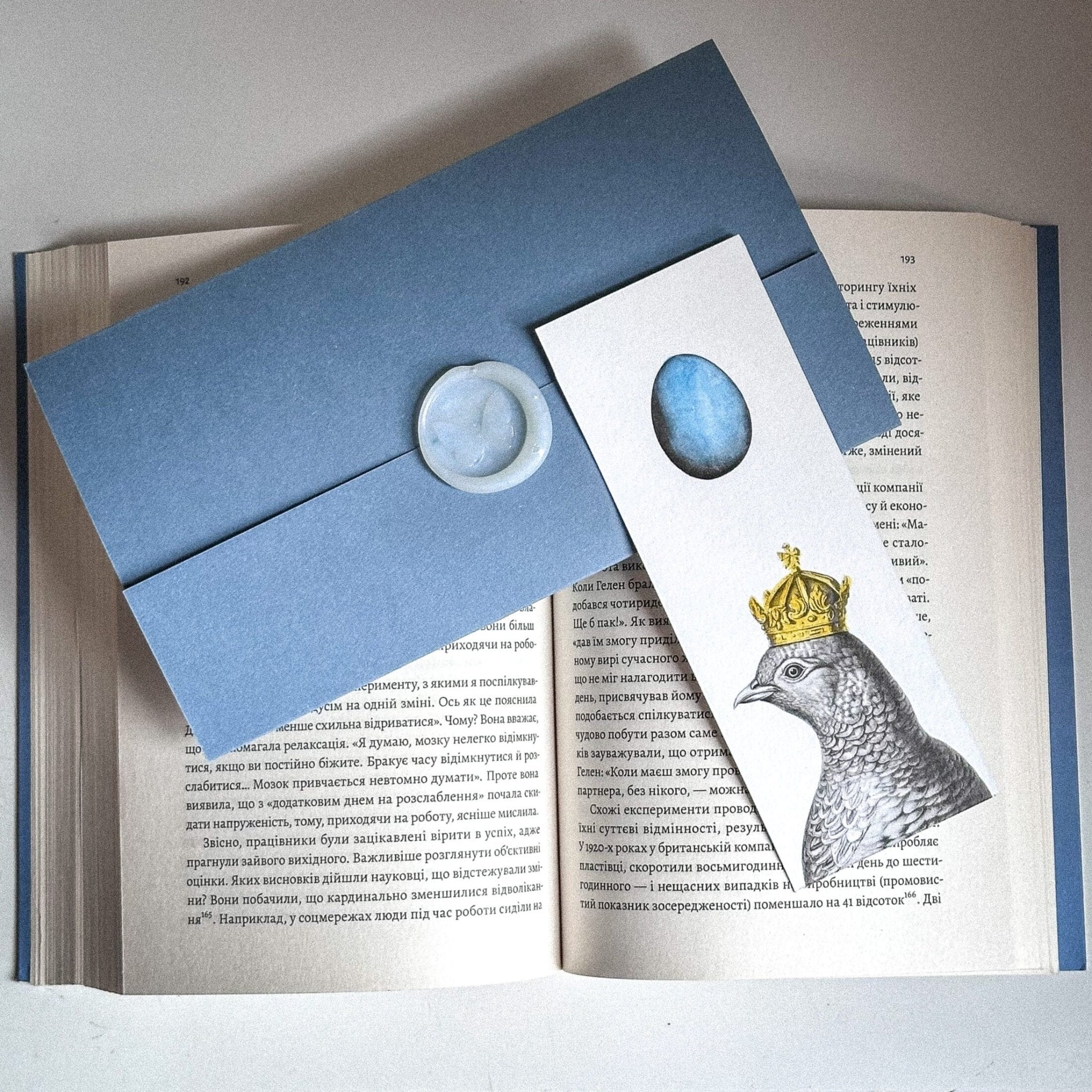 Handmade Paper Bookmark "Pigeon Queen and The Blue Egg." - Atelier Article