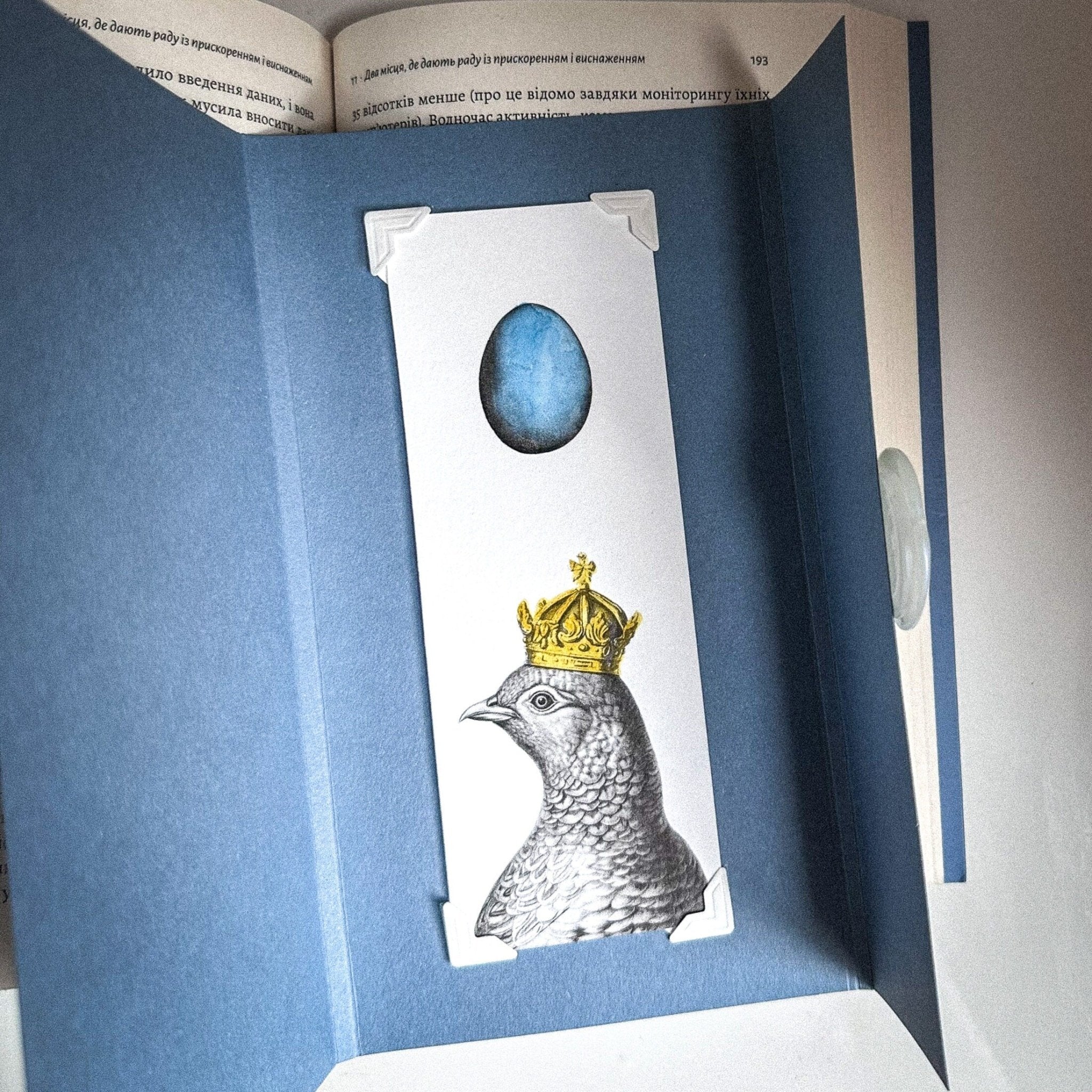 Handmade Paper Bookmark "Pigeon Queen and The Blue Egg." - Atelier Article