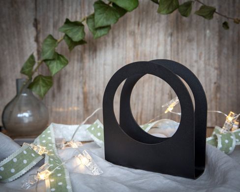 Simple and modern black metal napkin holder A hole in the wall. Designed and made in Ukraine.
