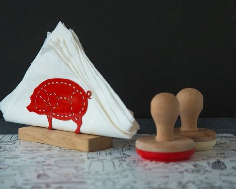 Red metal napkin holder Pig by Atelier Article