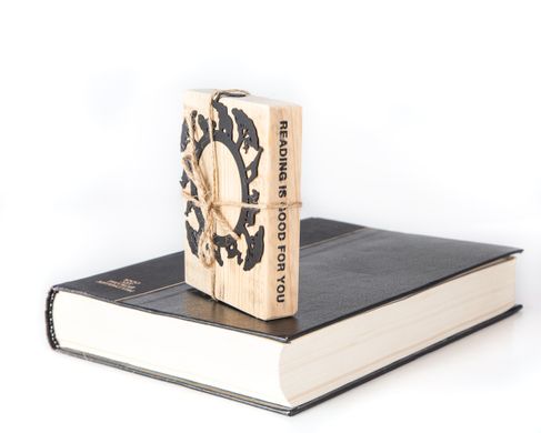 Stylish metal bookmark Africa - a circle of African animals and trees with a continent outline on its edge. Perfect Africa love party favor.